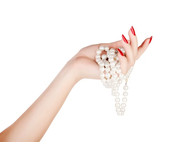 depositphotos_9932035-stock-photo-hand-of-woman-with-pearls